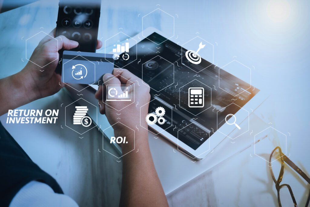 32258300 businessman hands holding plastic credit card and using digital