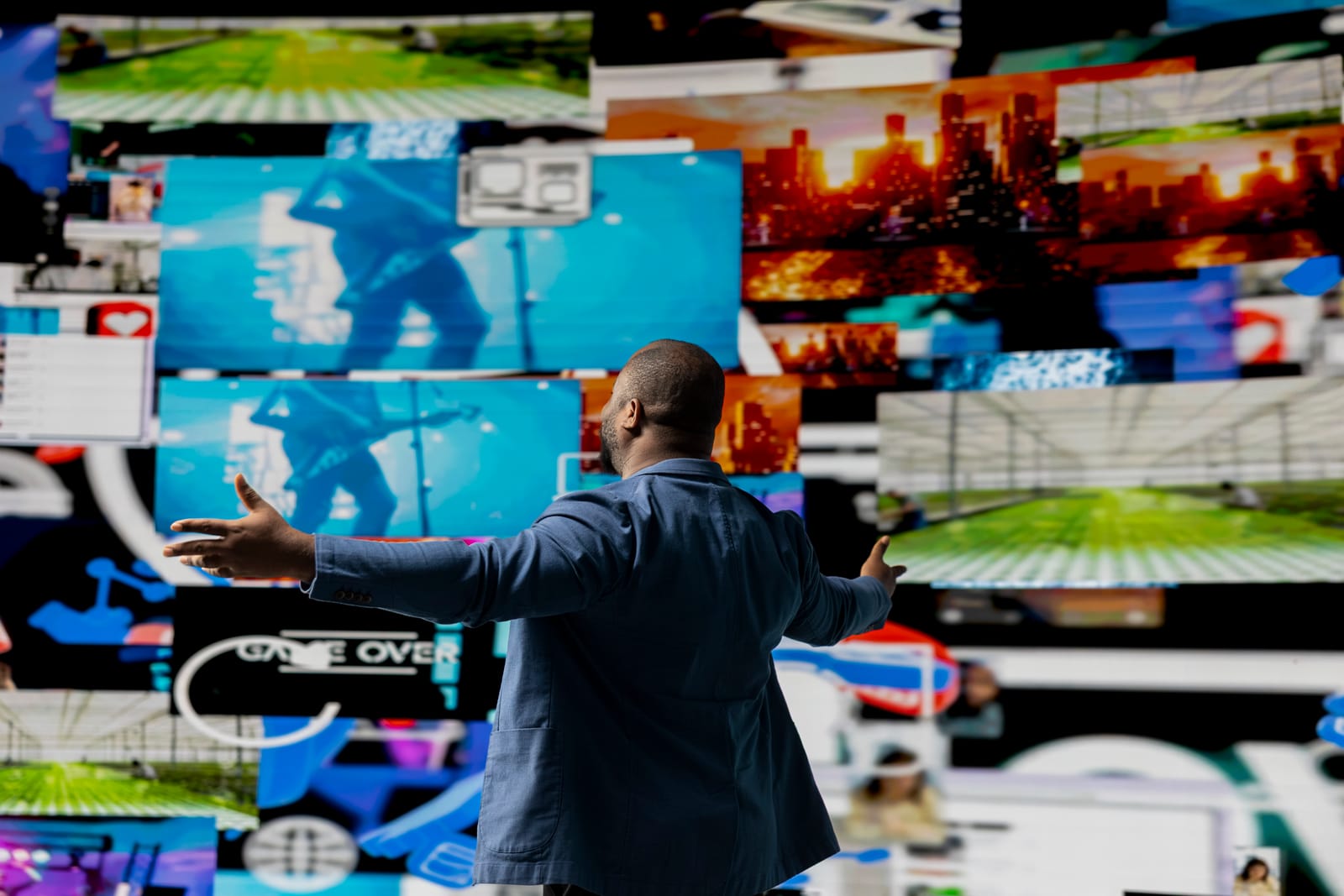 Blog 98608380 black social media manager browsing high tech environment with app interfaces